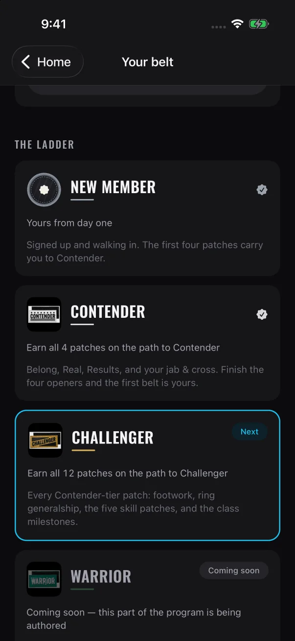 The ladder in the member's app says what each belt takes. Belts that aren't ready show "Coming soon".